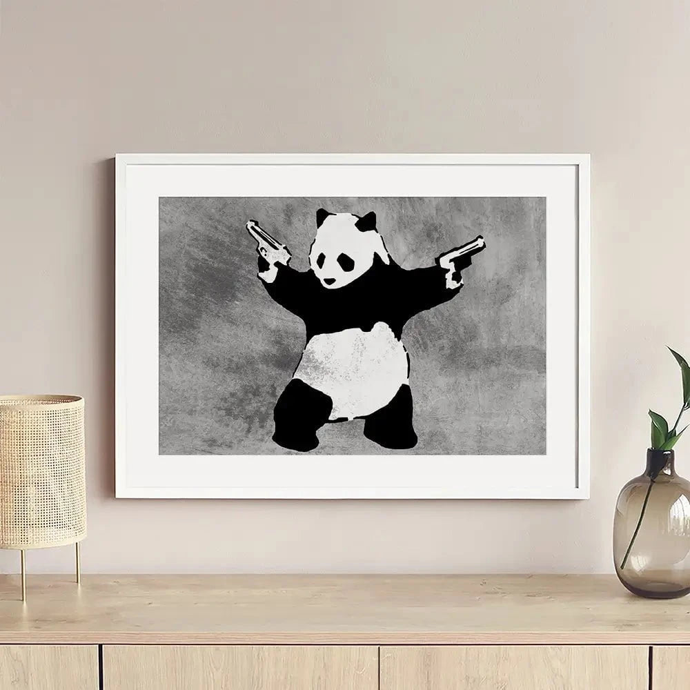 Panda Holding Guns Framed Art Print Panda Holding Guns Framed Art Print wall art product Banksy