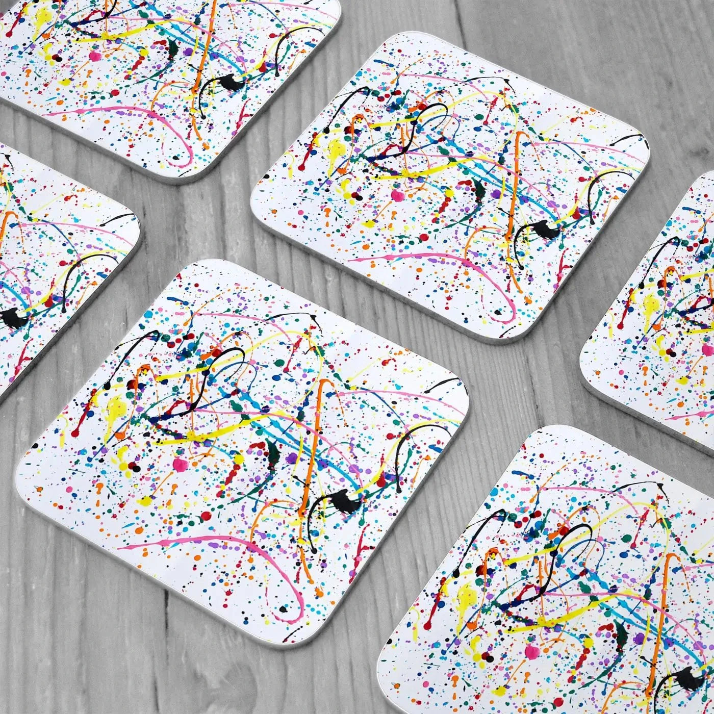 Splashes And Drips Coaster Set Splashes And Drips Coaster Set wall art product kenchiro168 / Shutterstock