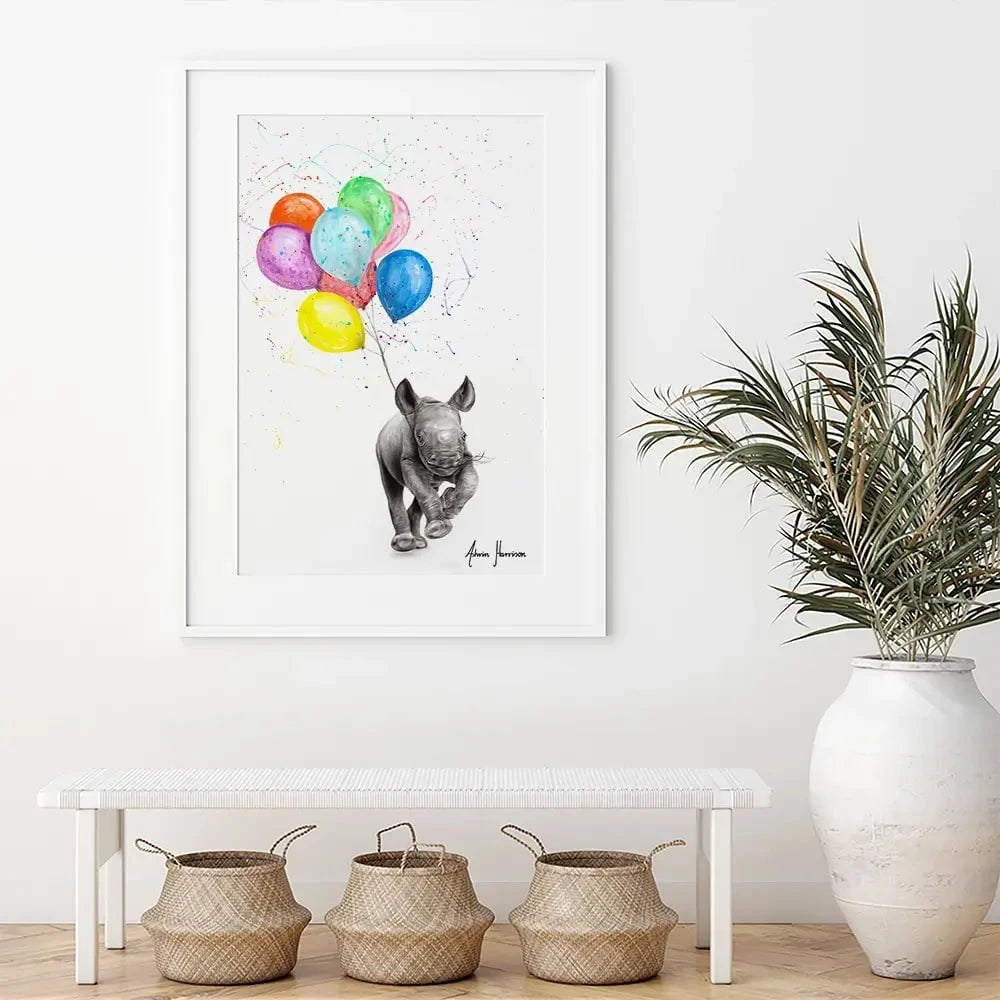The Rhino And The Balloons Framed Art Print The Rhino And The Balloons Framed Art Print wall art product Ashvin Harrison