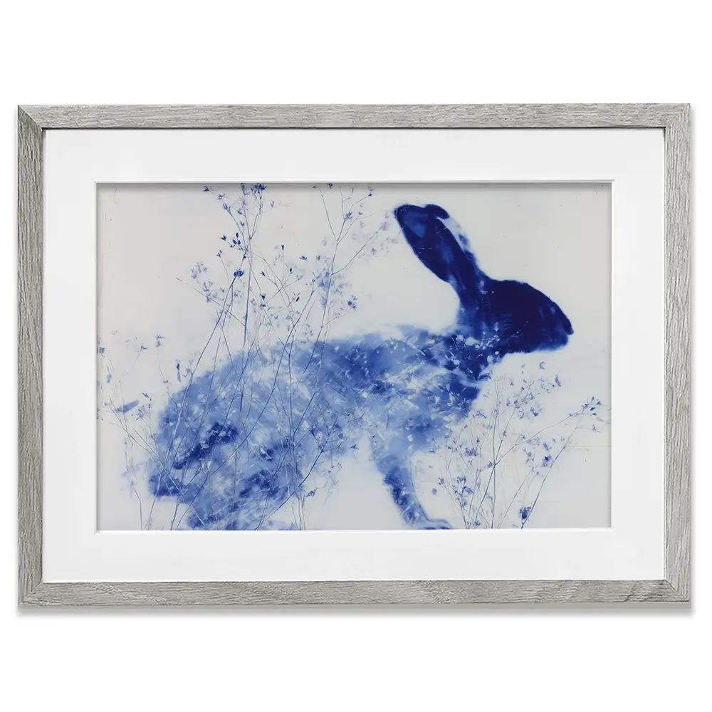 Blue Rabbit Silhouette With Wildflowers Framed Art Print Blue Rabbit Silhouette With Wildflowers Framed Art Print wall art product Chromatic Storm Studio