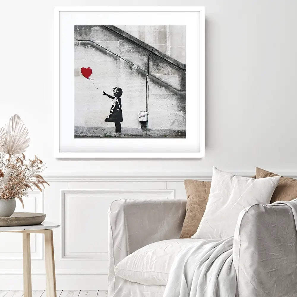 Girl And Heart Balloon Square Framed Art Print Girl And Heart Balloon Square Framed Art Print wall art product Banksy
