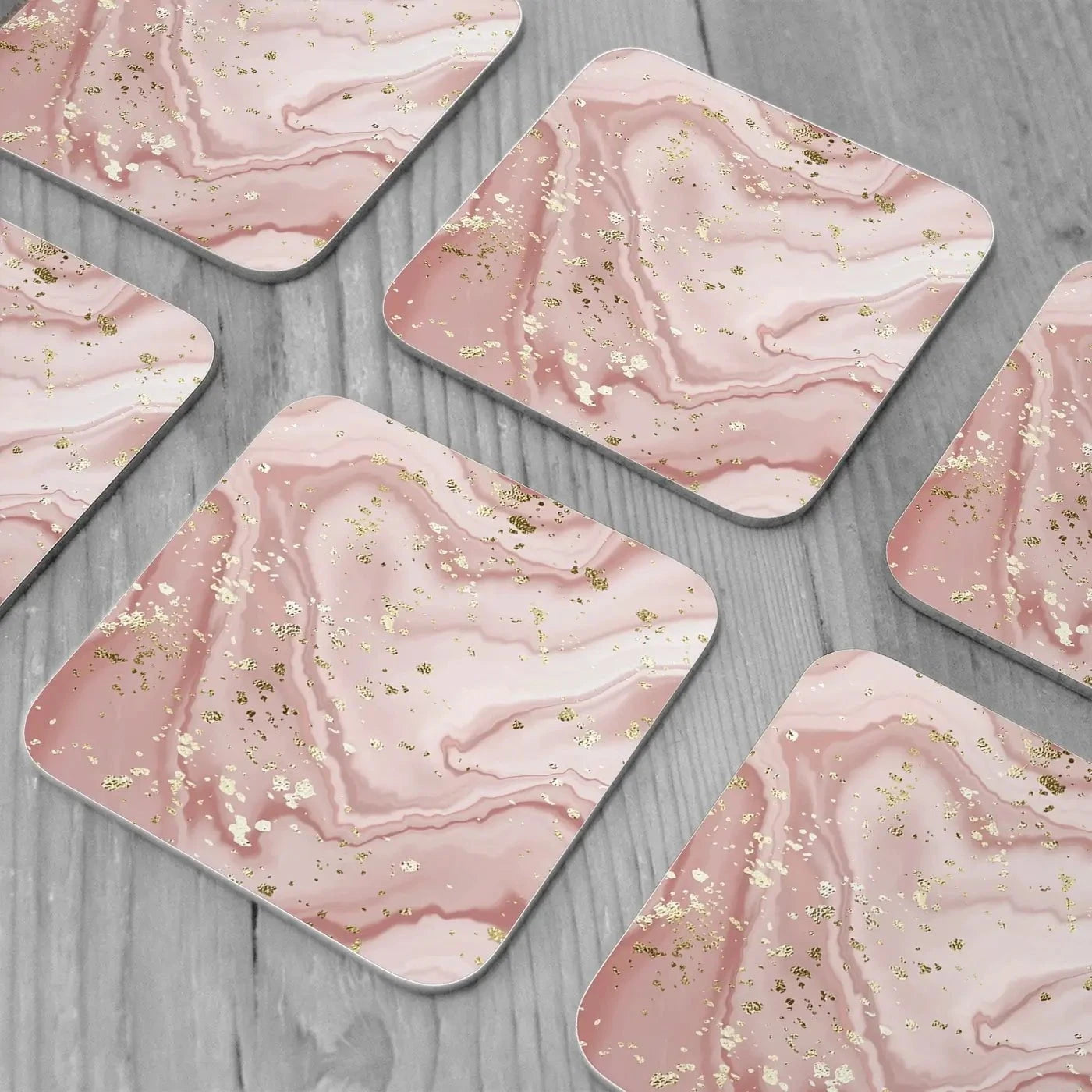 Rose Marble Speckles Coaster Set Rose Marble Speckles Coaster Set wall art product NikaMooni / Shutterstock