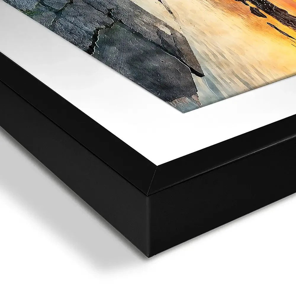 Sunrise Over A Lighthouse Framed Art Print Sunrise Over A Lighthouse Framed Art Print wall art product Helen Hotson / Shutterstock