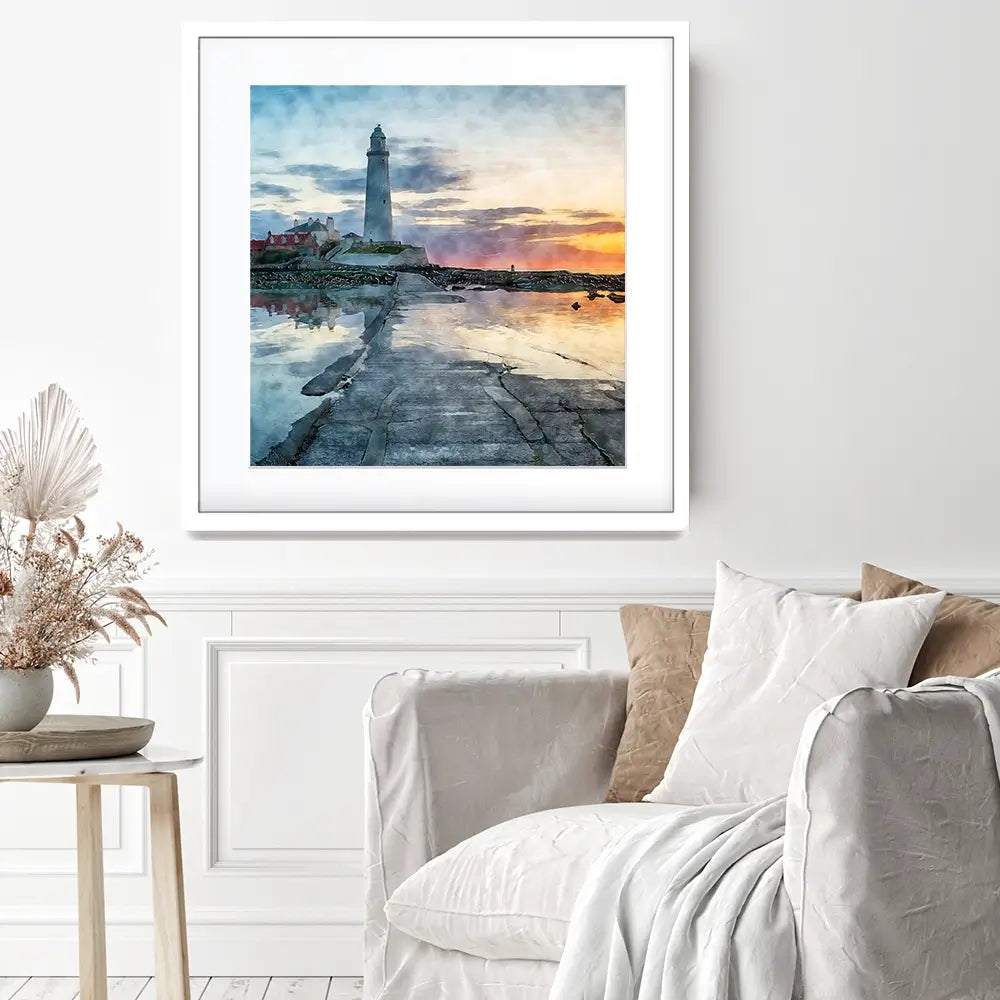 Sunrise Over A Lighthouse Square Framed Art Print Sunrise Over A Lighthouse Square Framed Art Print wall art product Helen Hotson / Shutterstock