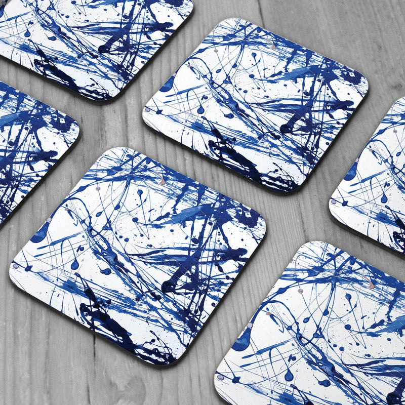 Blue Paint Spatter Coaster Set wall art product Nataliya Sdobnikova / Shutterstock
